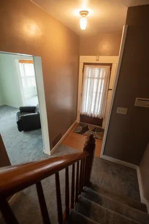 a view of an entryway with staircase