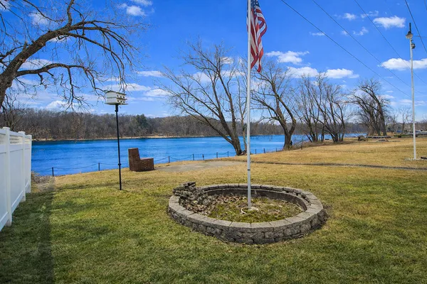 a aerial view of a house with a yard