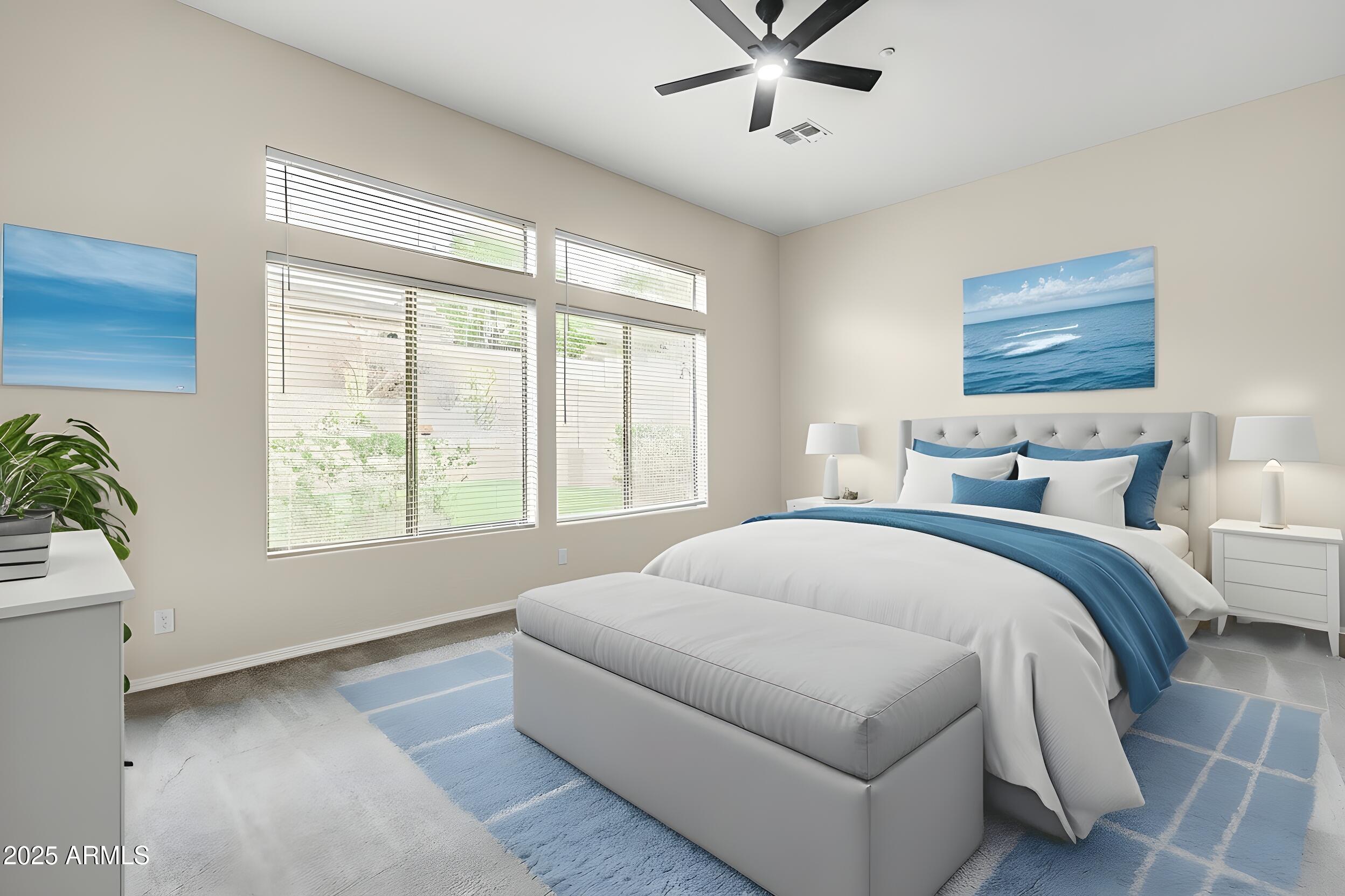 3138 West Ravina Lane Anthem, AZ 85086 - Photo 15 of 38 a bedroom with a large bed and a window