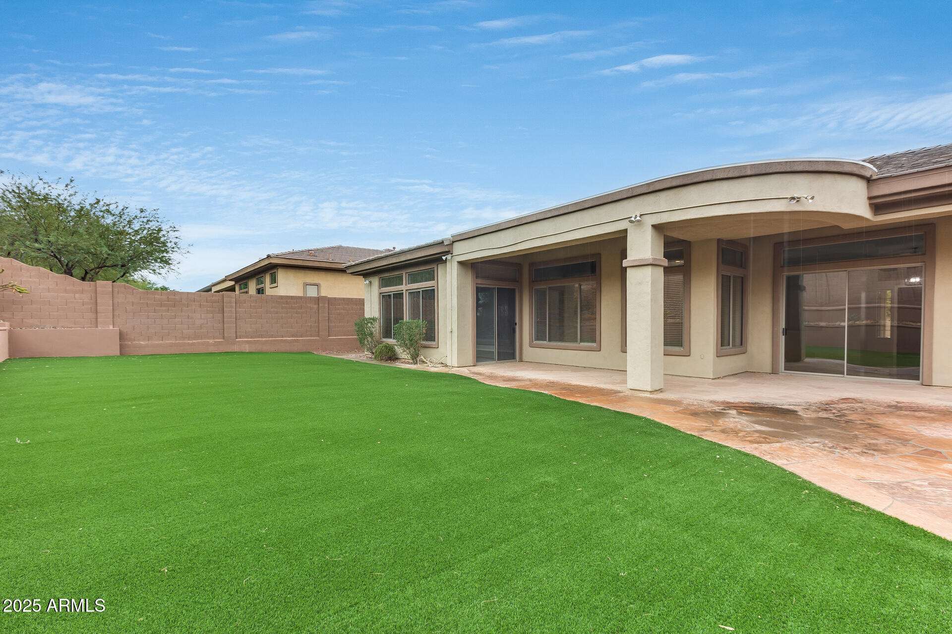3138 West Ravina Lane Anthem, AZ 85086 - Photo 22 of 38 a view of a house with a backyard