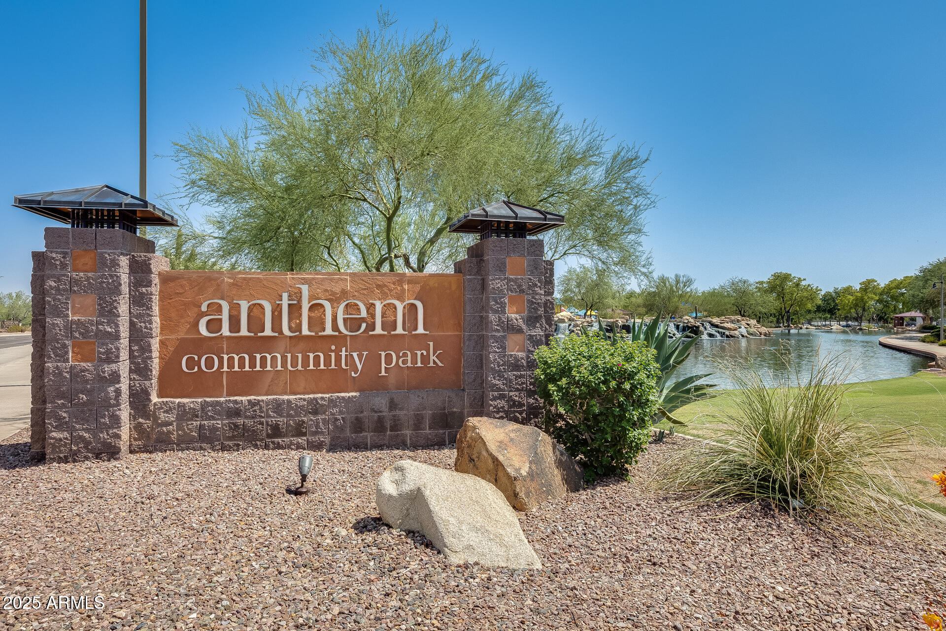 3138 West Ravina Lane Anthem, AZ 85086 - Photo 26 of 38 a sign that is on the side of the road