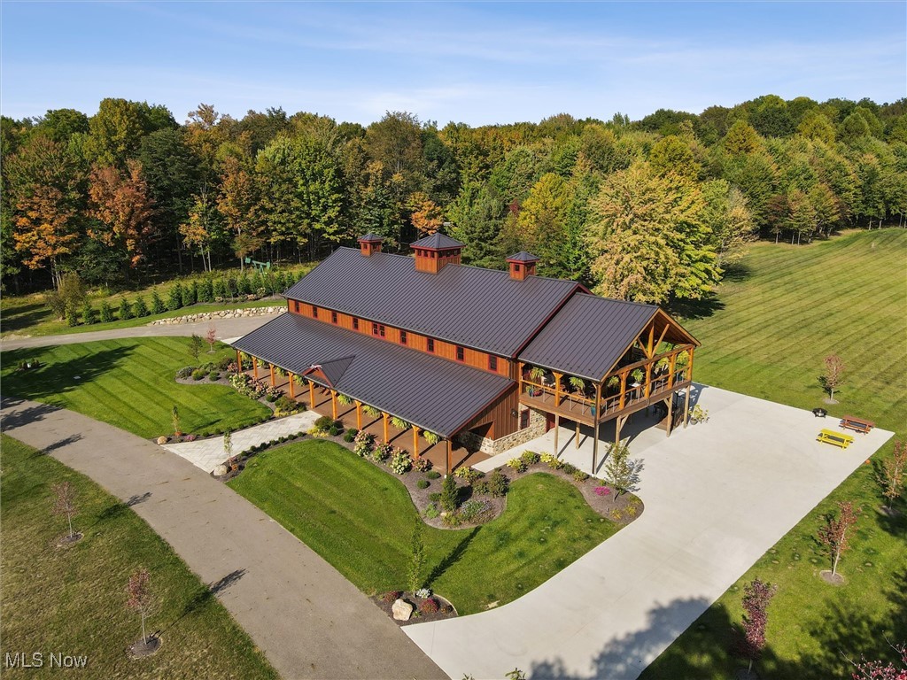 290 Townline Road Aurora, OH 44202 - Photo 44 of 50 View from above of property featuring a heavily wooded area