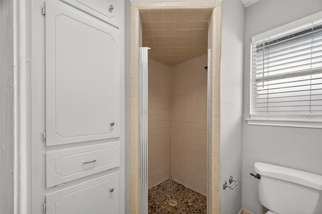 a bathroom with a toilet sink