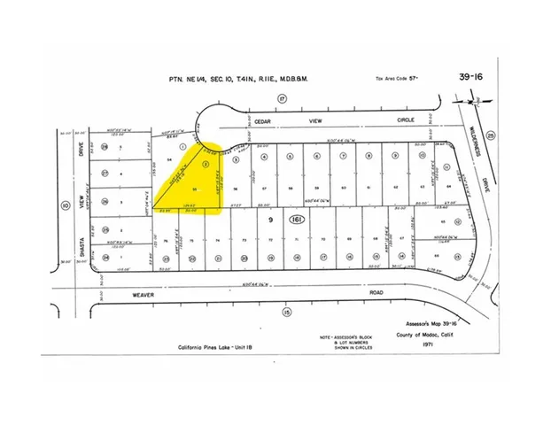 a black and white photo of a bench