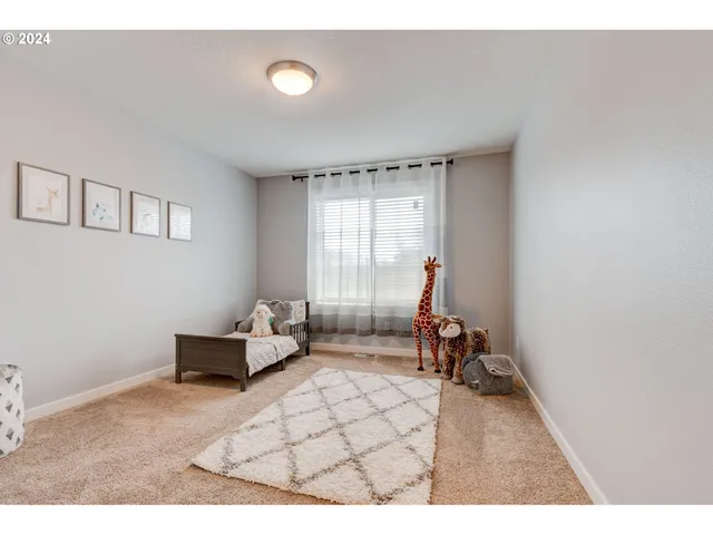 a room with furniture and a window