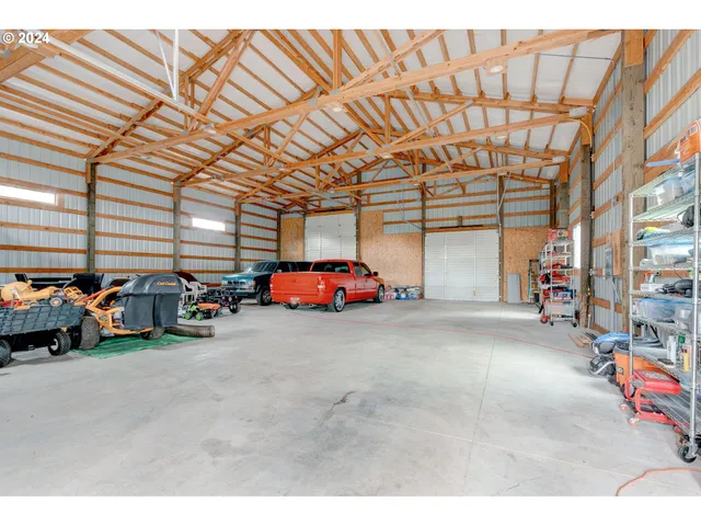 an aerial view of a house with a ocean view