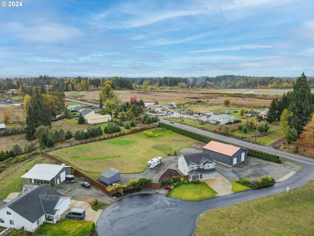 a view of a swimming pool with a yard