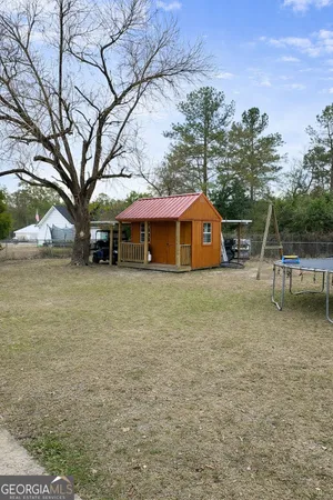 a house view with a garden space