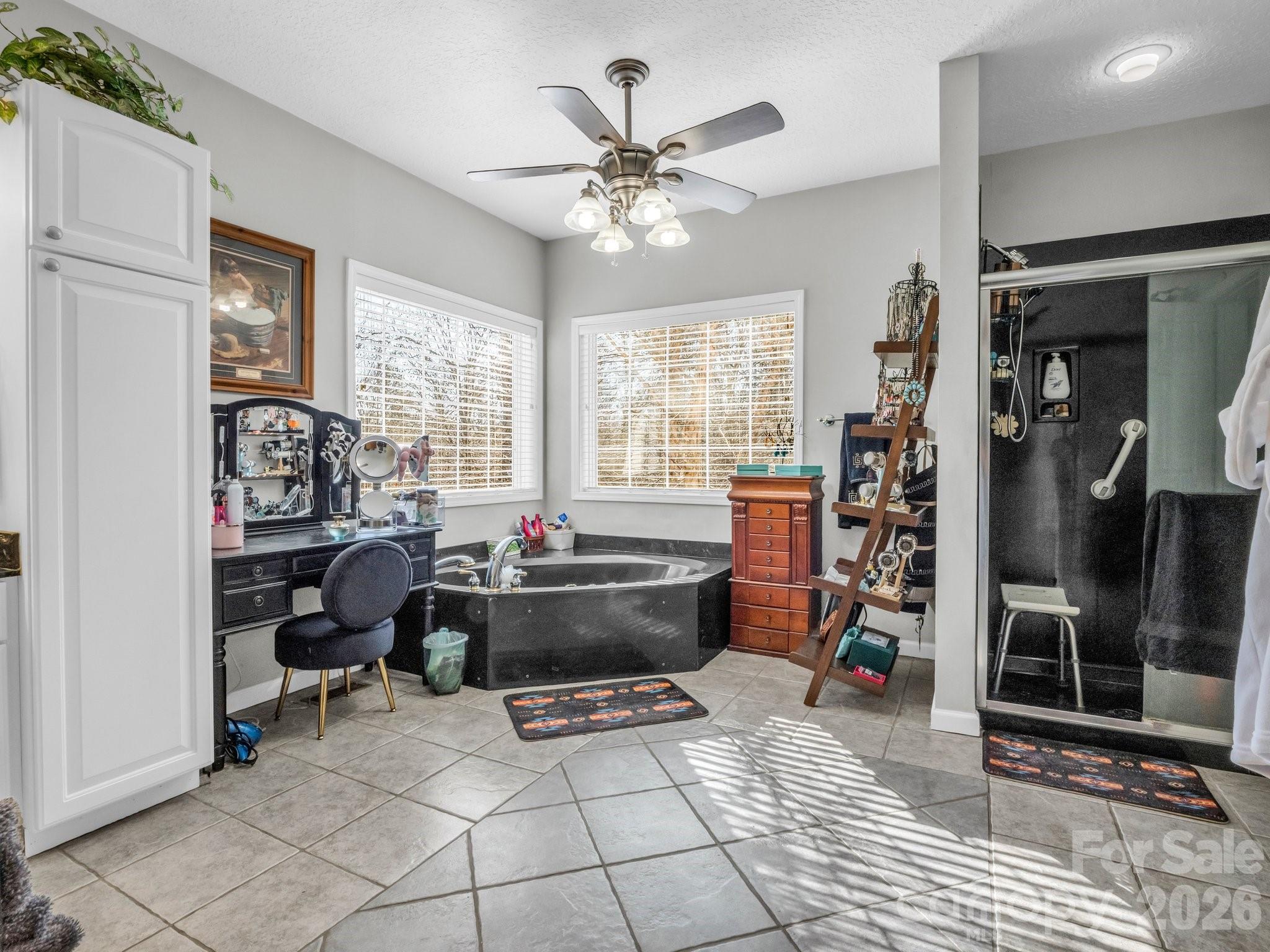 532 Harvey Logan Road Bostic, NC 28018 - Photo 35 of 48 a living room with furniture and a chandelier