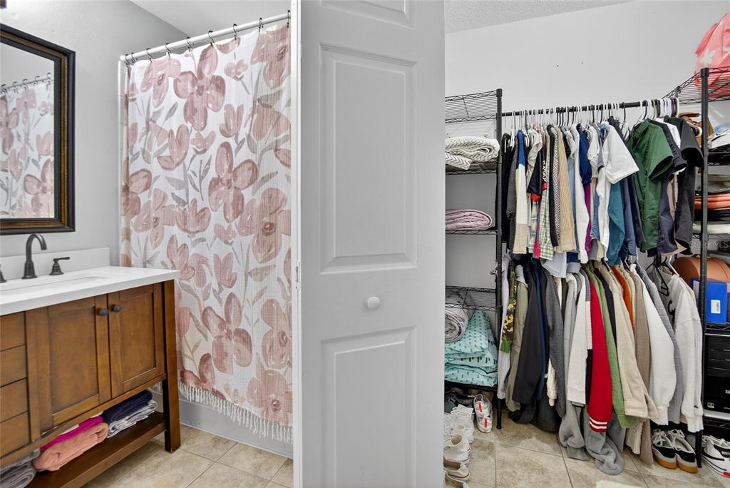 630 Cape Cod Circle Valrico, FL 33594 - Photo 23 of 48 a view of walk in closet with clothes