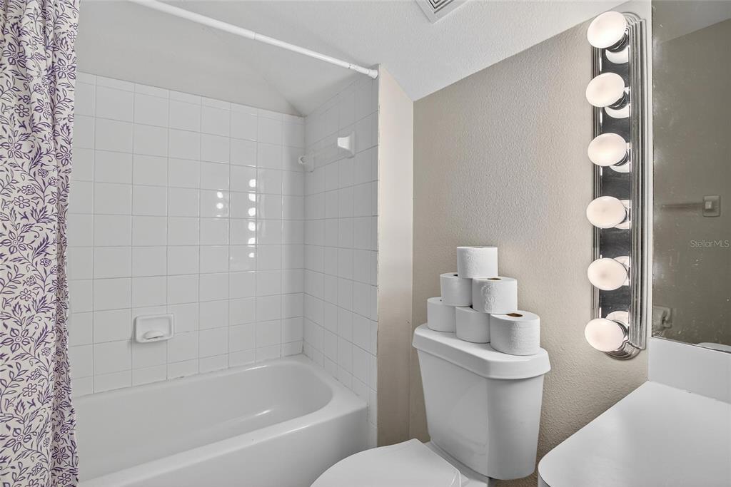 630 Cape Cod Circle Valrico, FL 33594 - Photo 37 of 48 a bathroom with a toilet a sink and bathtub