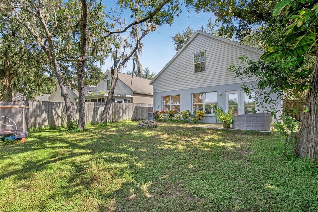 630 Cape Cod Circle Valrico, FL 33594 - Photo 39 of 48 a front view of a house with a yard
