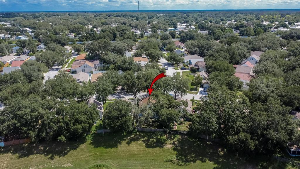 630 Cape Cod Circle Valrico, FL 33594 - Photo 46 of 48 an aerial view of residential house with outdoor space and trees all around