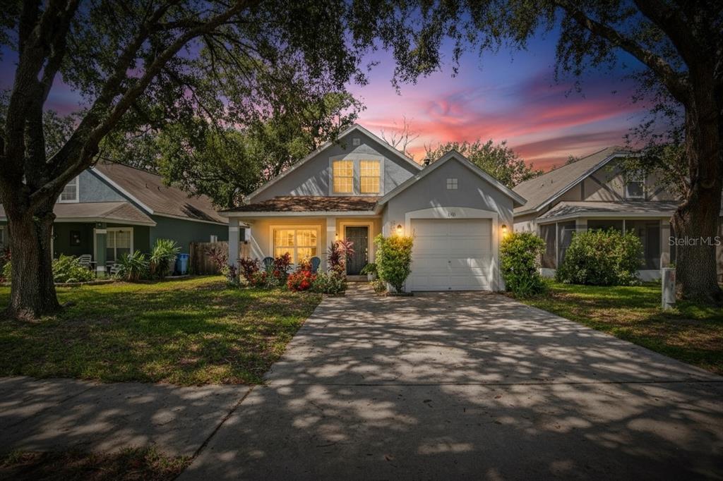 630 Cape Cod Circle Valrico, FL 33594 - Photo 48 of 48 a front view of a house with a garden