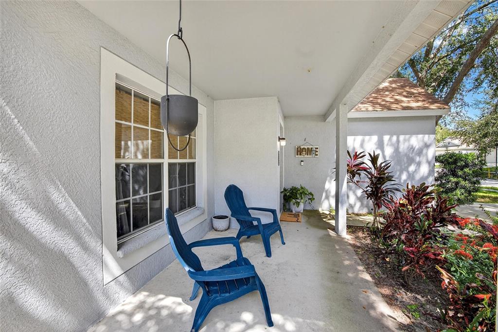 630 Cape Cod Circle Valrico, FL 33594 - Photo 8 of 48 a living room with furniture and a potted plant