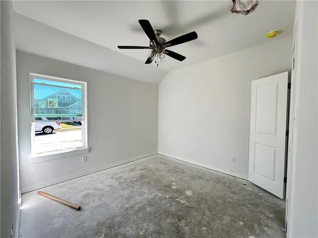 a picture of a bathroom with a shower and a mirror