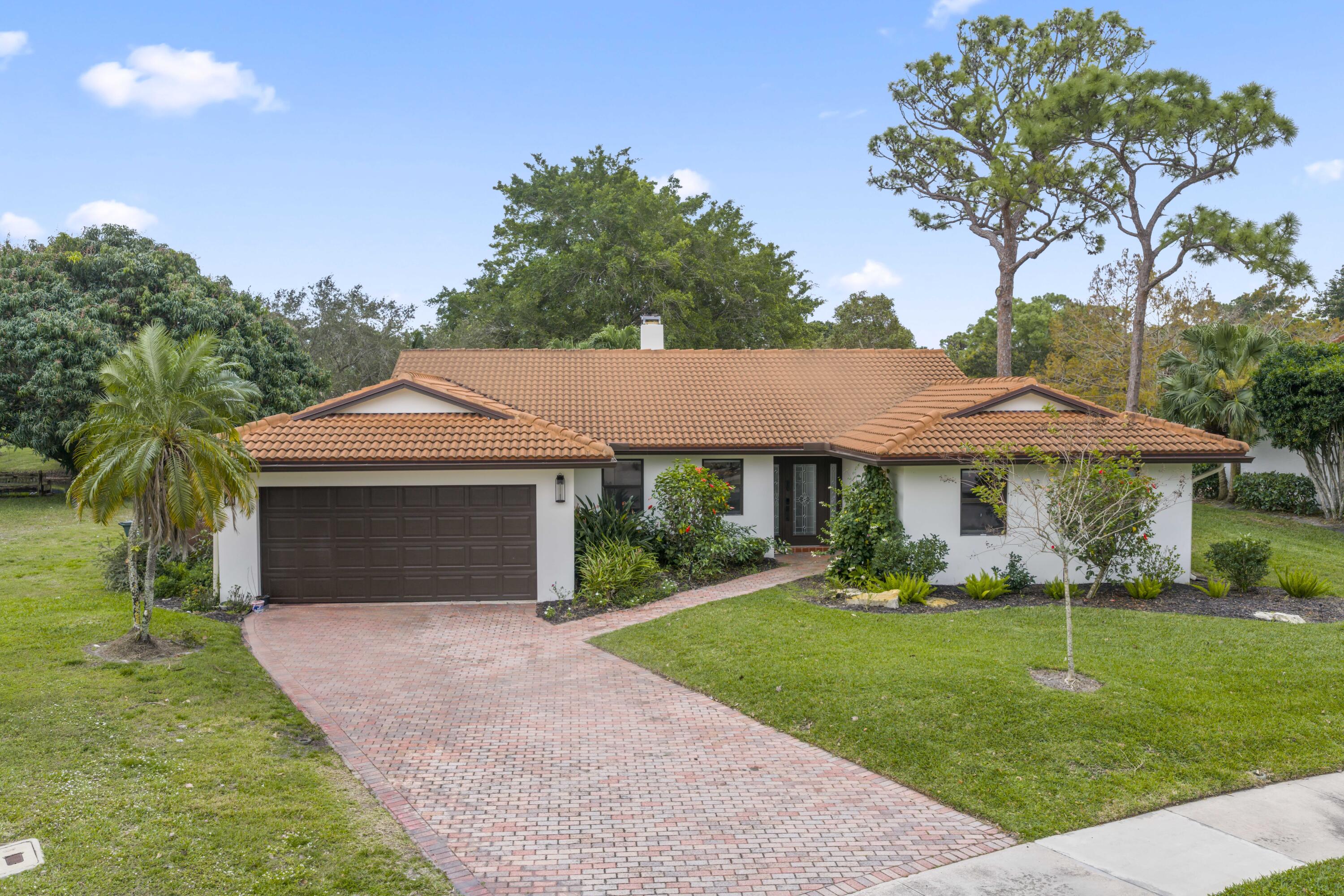 2708 Northwest 26th Circle Boca Raton, FL 33431 - Photo 1 of 24 2708 NW 26th Circle