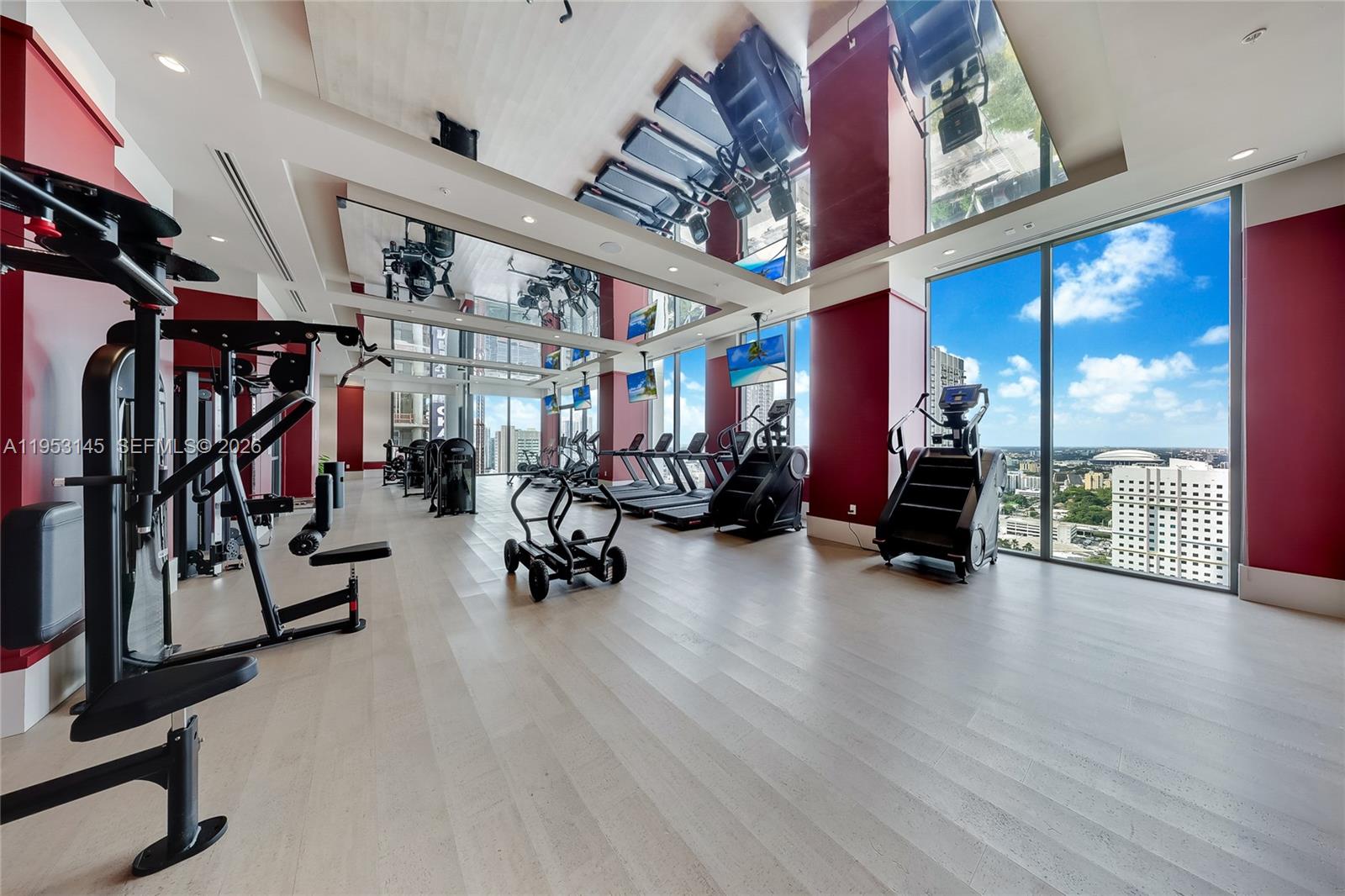11 Northeast 6th Street, Unit 3209 Miami, FL 33132 - Photo 21 of 30 a view of a room with gym equipment