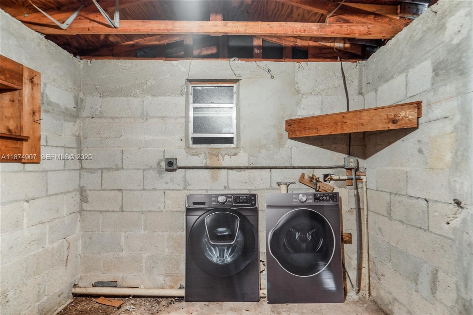 6535 Northwest 6th Avenue Miami, FL 33150 - Photo 14 of 14 a utility room with dryer and washer