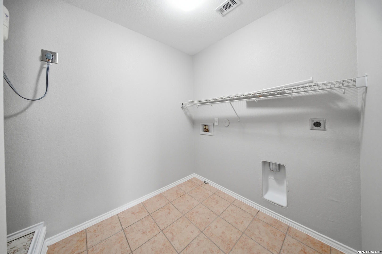 403 Walnut Crest Schertz, TX 78154 - Photo 25 of 30 a view of a rack on the wall