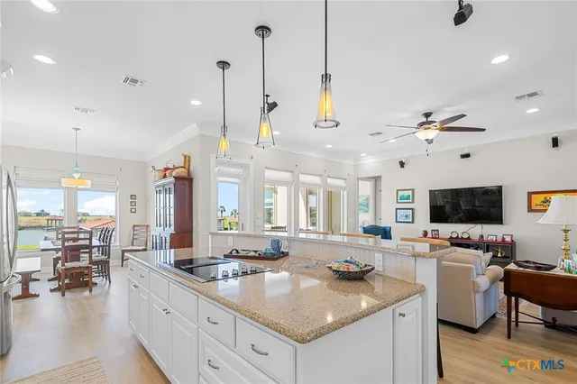 a kitchen with sink cabinets and counter top space