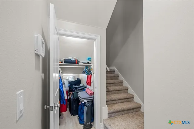 a view of a workspace with furniture