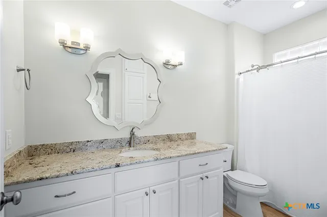 a view of a lake from a balcony