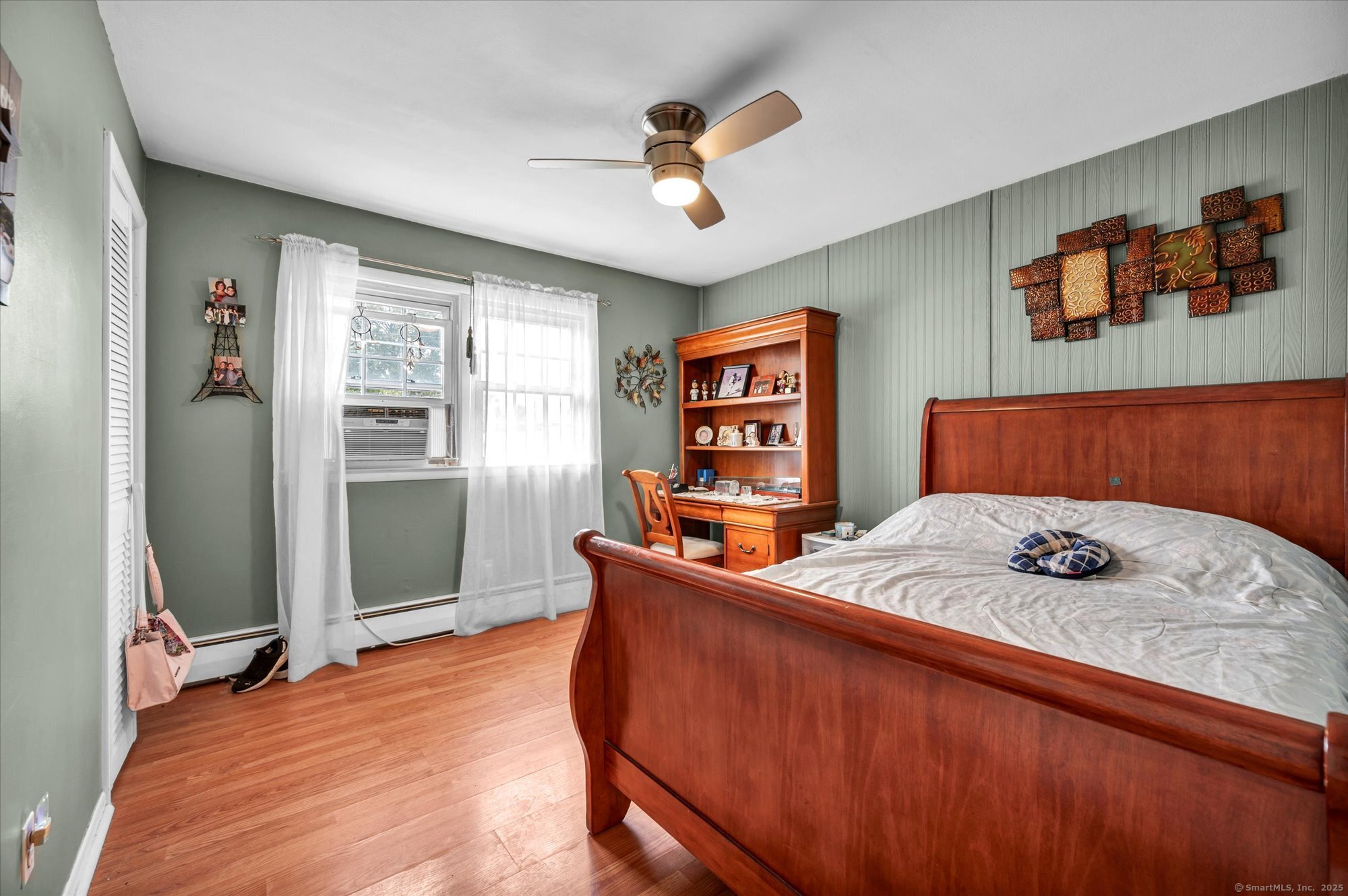 77 Oxbow Lane West Haven, CT 06516 - Photo 20 of 27 a bedroom with a bed and a dresser