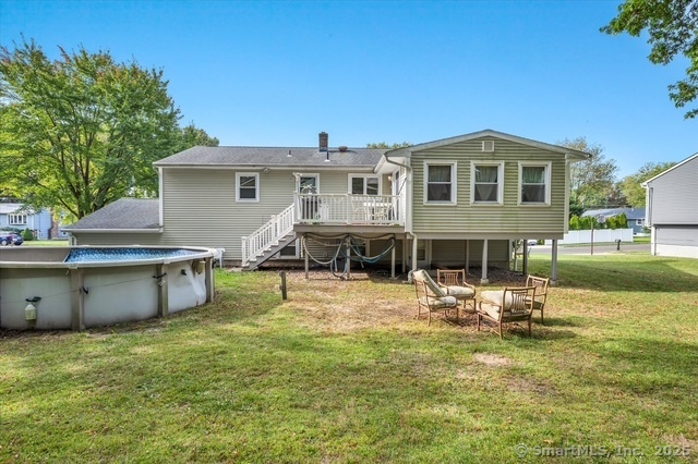 77 Oxbow Lane West Haven, CT 06516 - Photo 5 of 27 a front view of a house with swimming pool