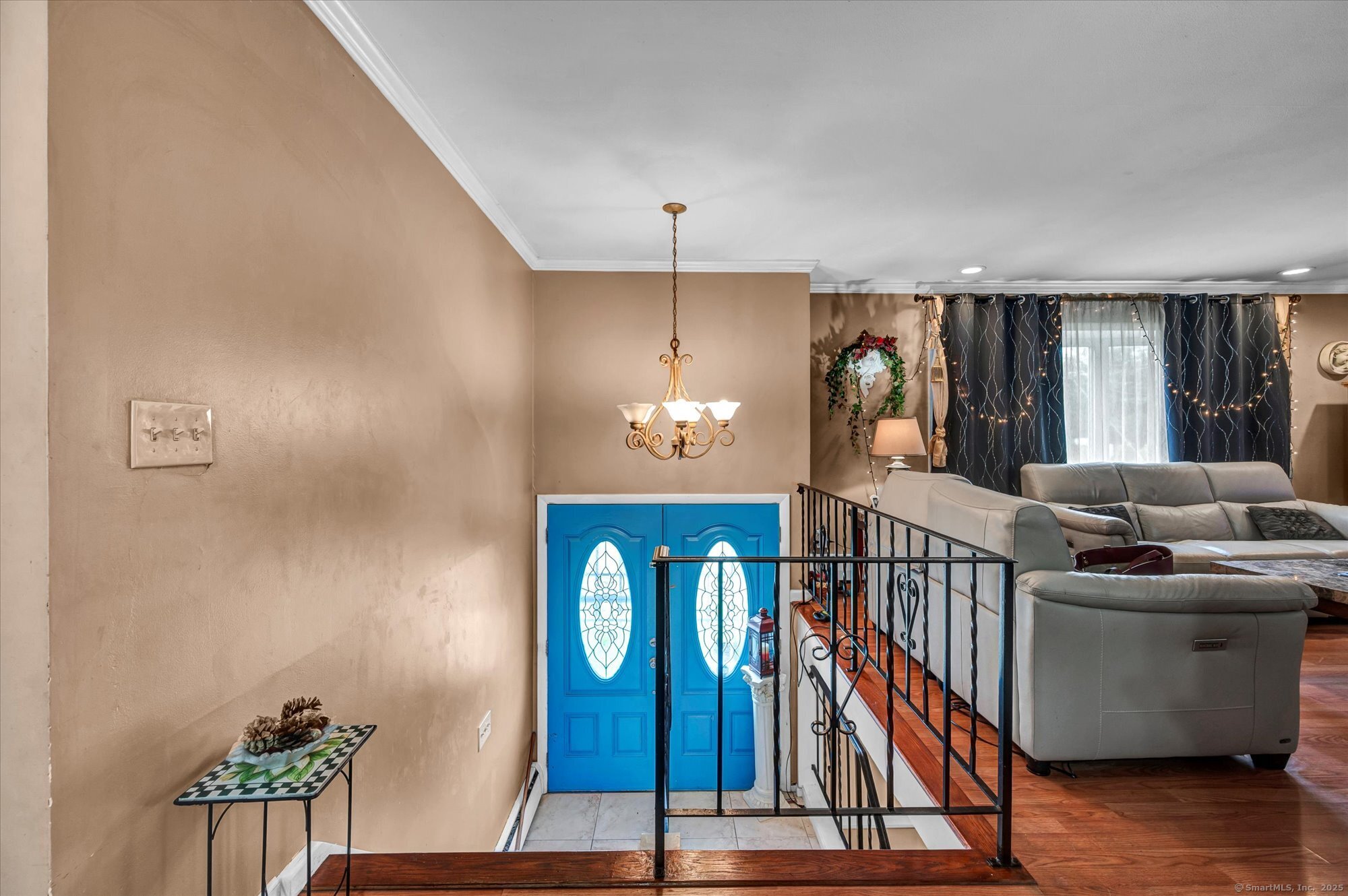 77 Oxbow Lane West Haven, CT 06516 - Photo 7 of 27 a living room with furniture a window and a wooden floor