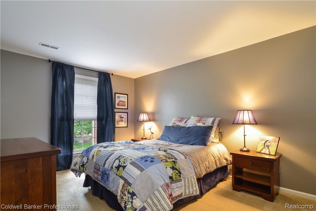 1940 Flagstone Circle, Unit 95 Rochester, MI 48307 - Photo 17 of 33 017-Bedroom-4271003-large.jpg