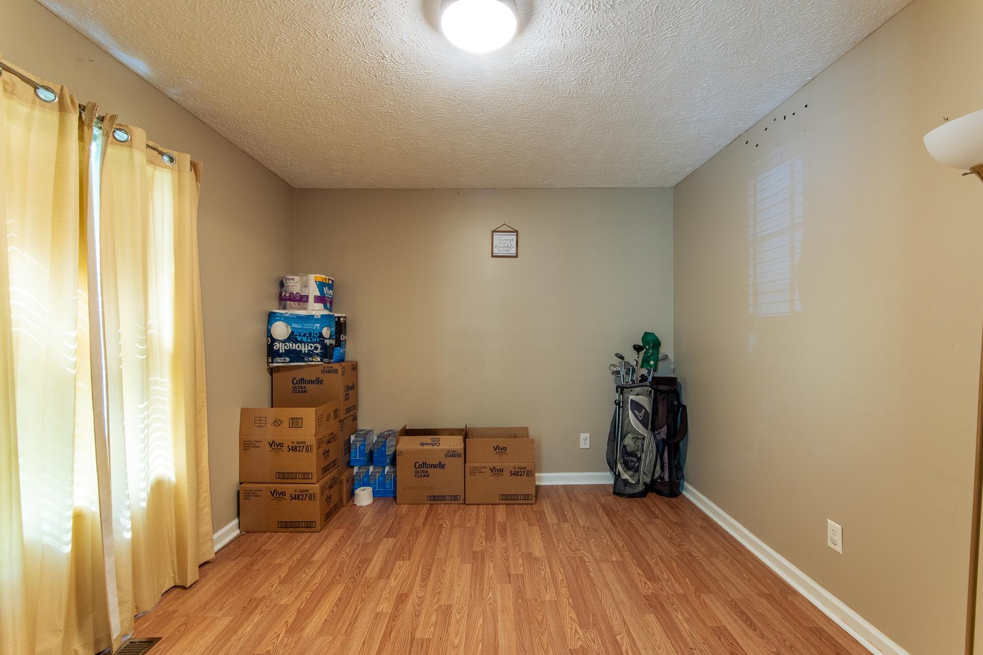 5584 Ramer Selmer Road Selmer, TN 38375 - Photo 11 of 31 a view of an empty room and wooden floor