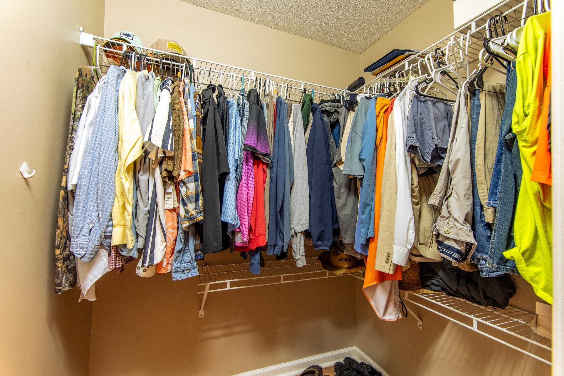 5584 Ramer Selmer Road Selmer, TN 38375 - Photo 16 of 31 a view of walk in closet with clothes