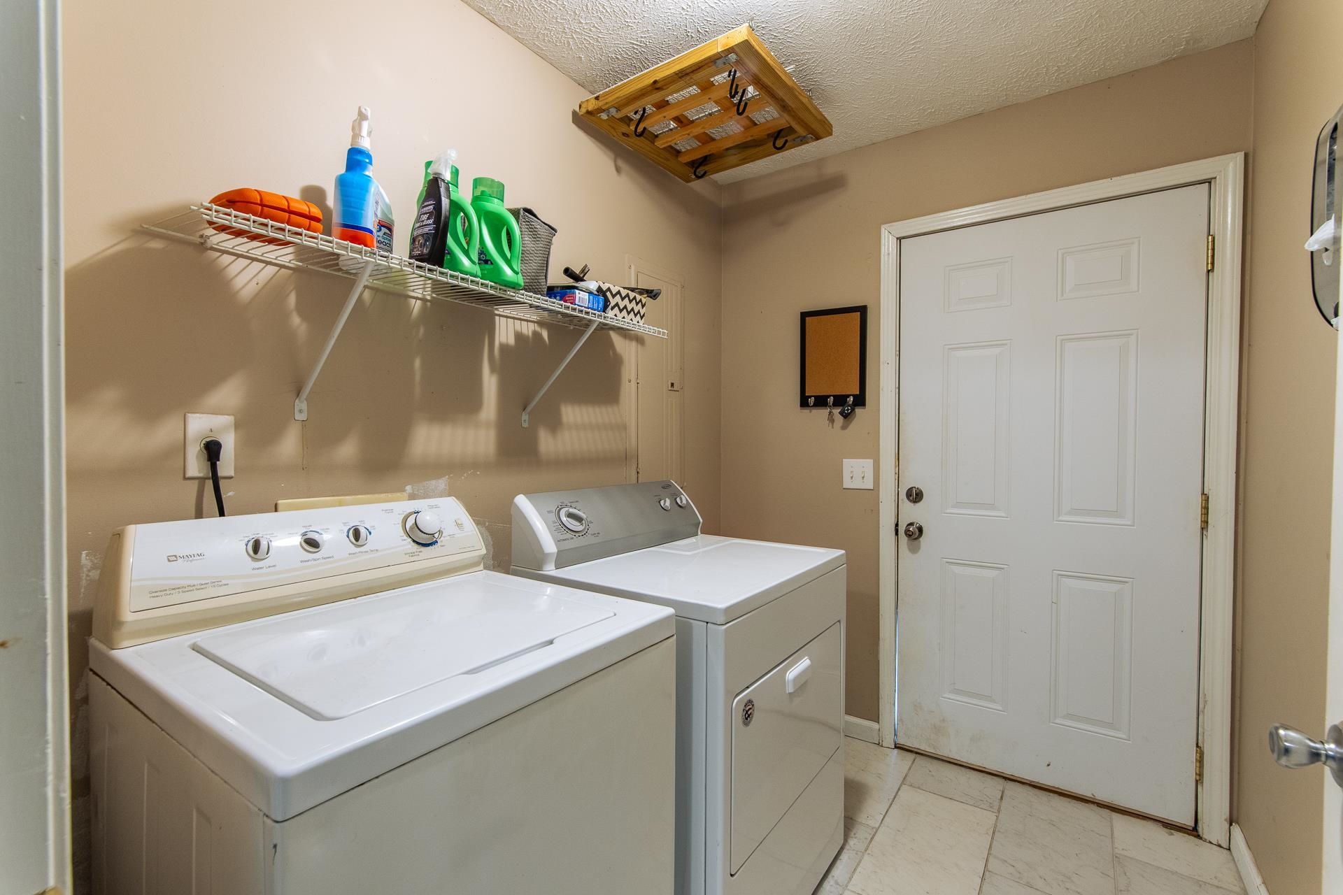 5584 Ramer Selmer Road Selmer, TN 38375 - Photo 28 of 31 a utility room with dryer and washer