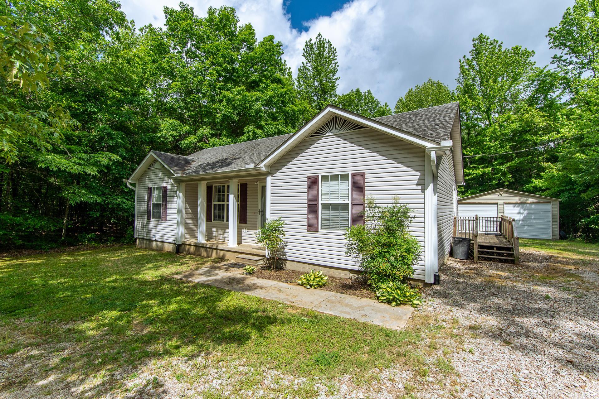 5584 Ramer Selmer Road Selmer, TN 38375 - Photo 6 of 31 a front view of house with yard and green space