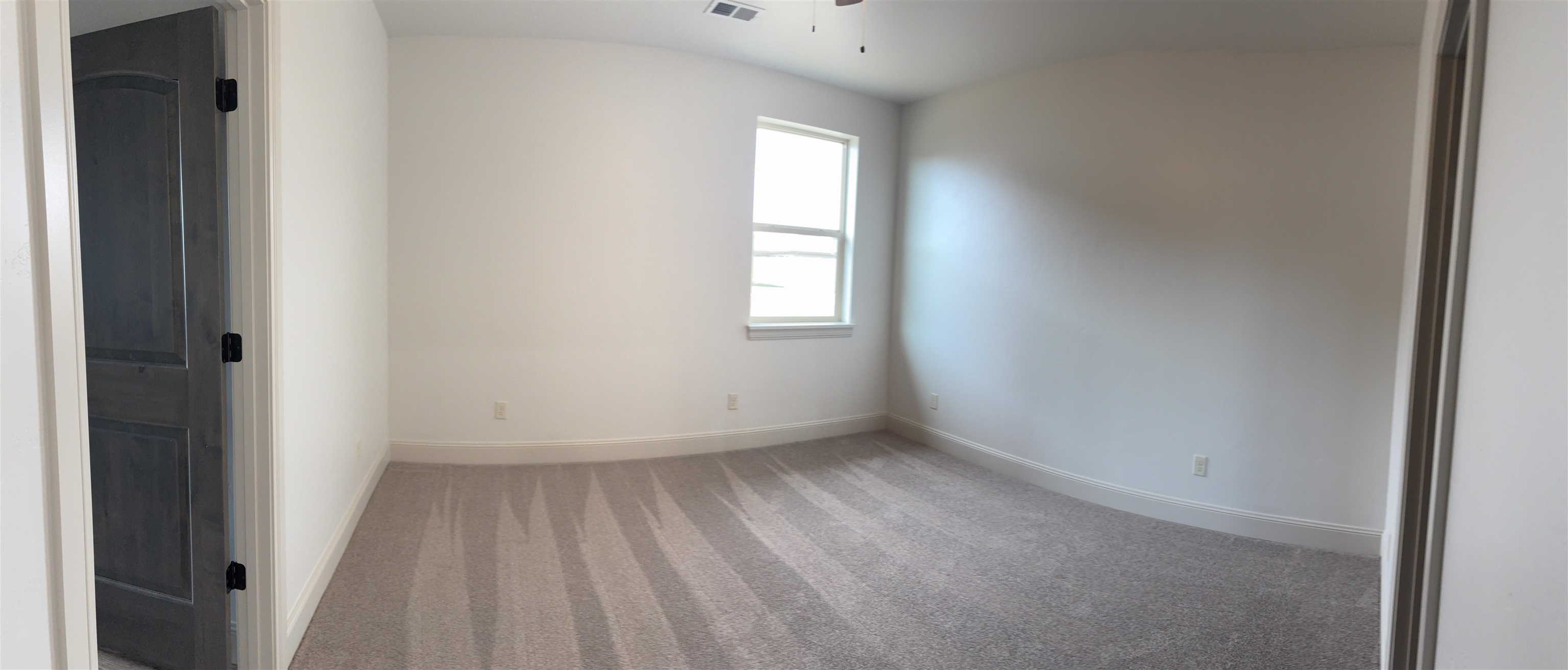2641 Emerald Ridge Lane Grand Junction, CO 81506 - Photo 13 of 42 an empty room with a window