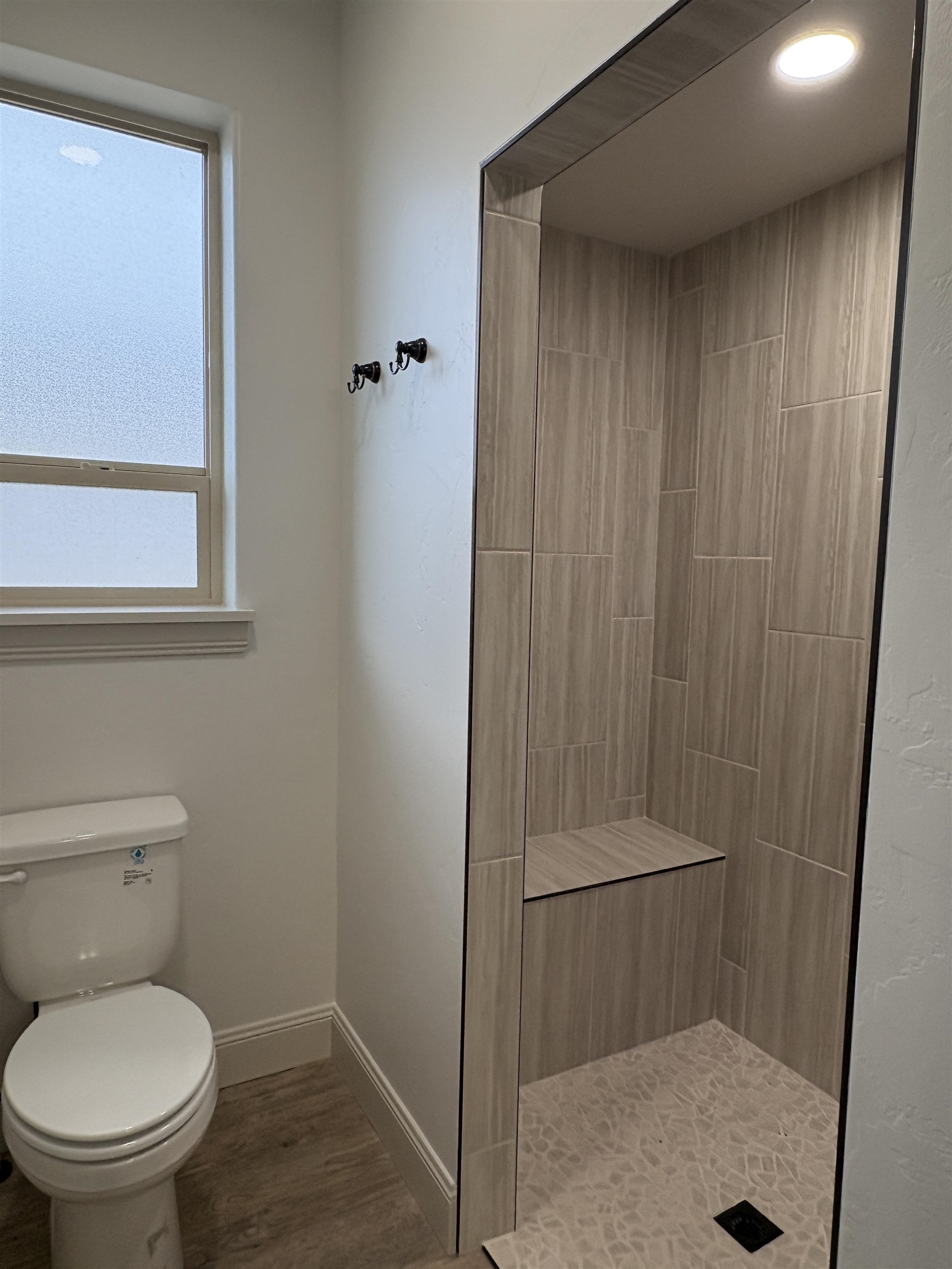 2641 Emerald Ridge Lane Grand Junction, CO 81506 - Photo 16 of 42 a bathroom with a toilet and a shower