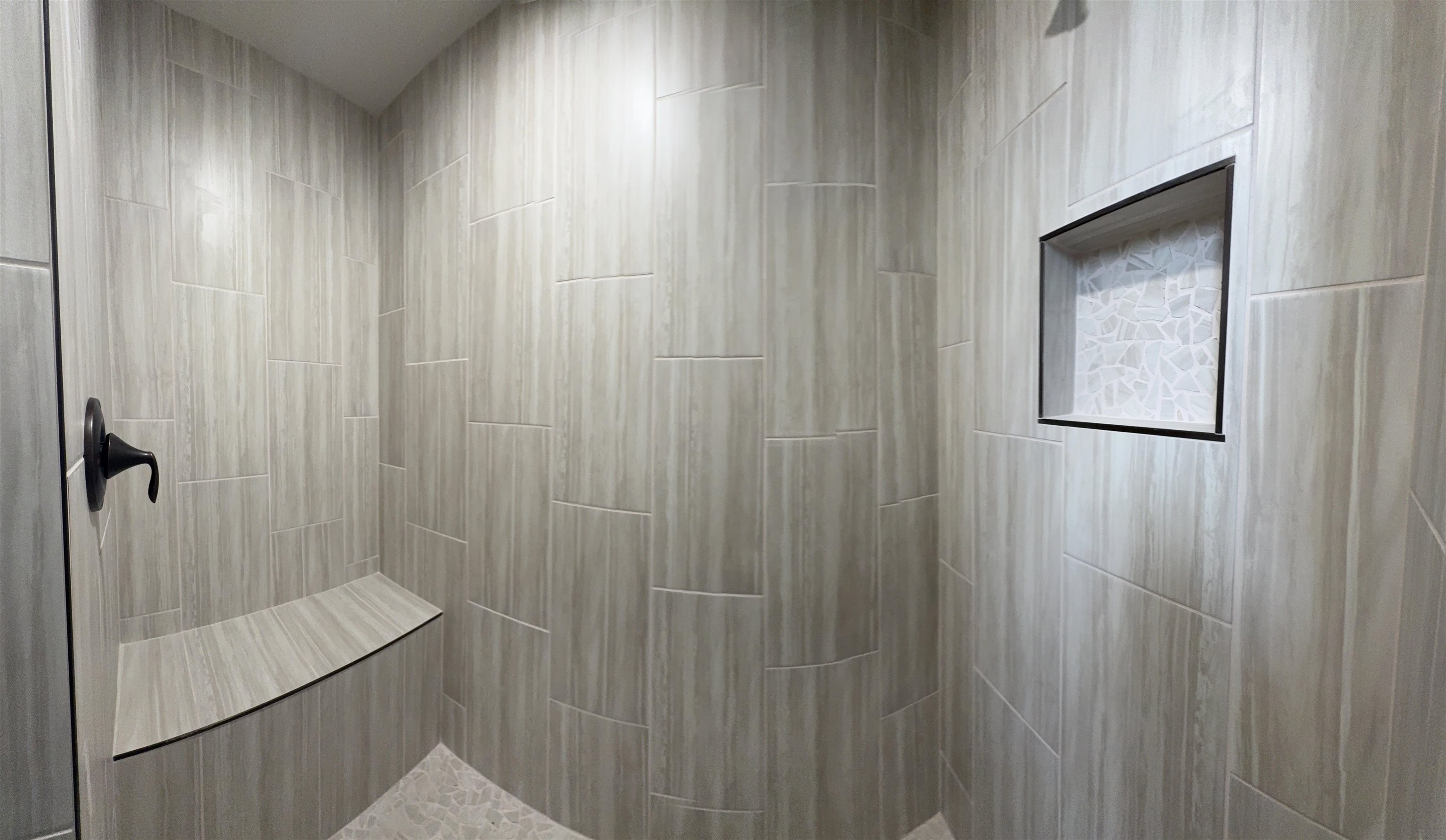 2641 Emerald Ridge Lane Grand Junction, CO 81506 - Photo 17 of 42 a bathroom with a shower and a sink