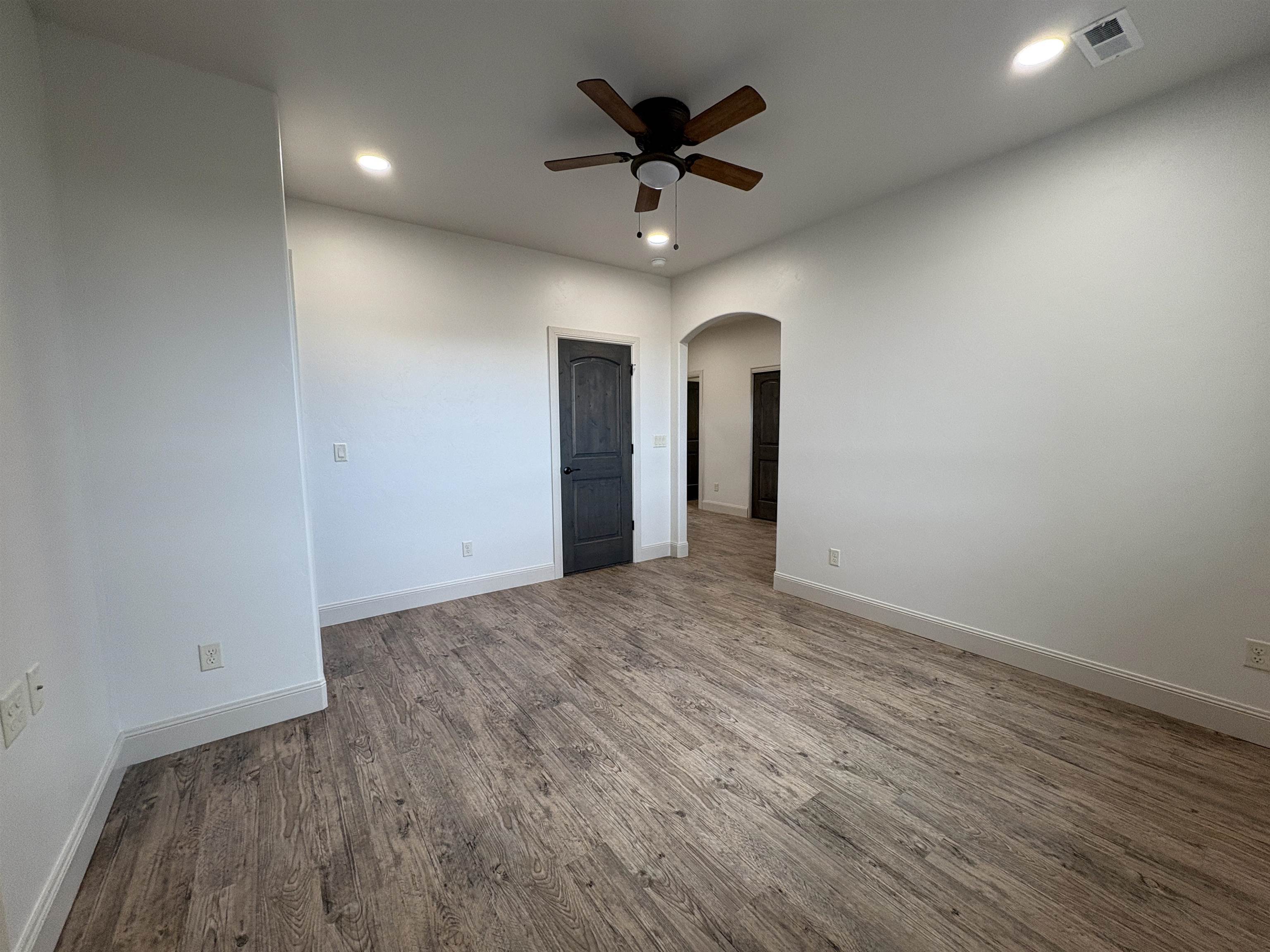 2641 Emerald Ridge Lane Grand Junction, CO 81506 - Photo 18 of 42 an empty room with closet and ceiling fan