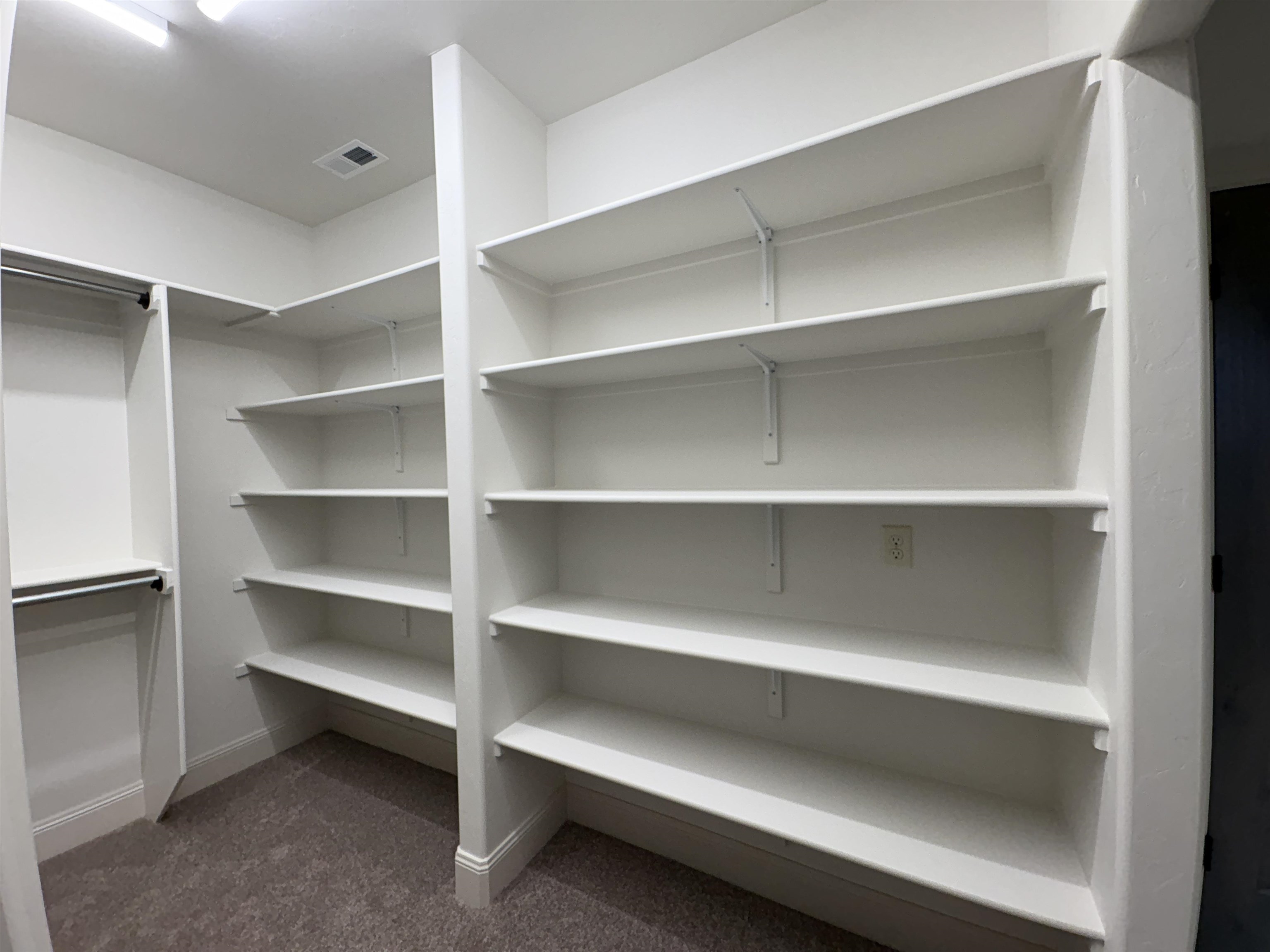 2641 Emerald Ridge Lane Grand Junction, CO 81506 - Photo 33 of 42 a view of walk in closet with empty racks