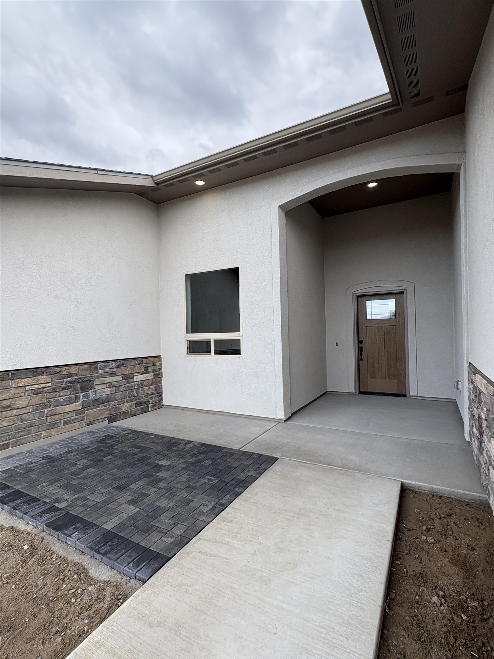 2641 Emerald Ridge Lane Grand Junction, CO 81506 - Photo 35 of 42 a view of a livingroom with an empty space and wooden floor