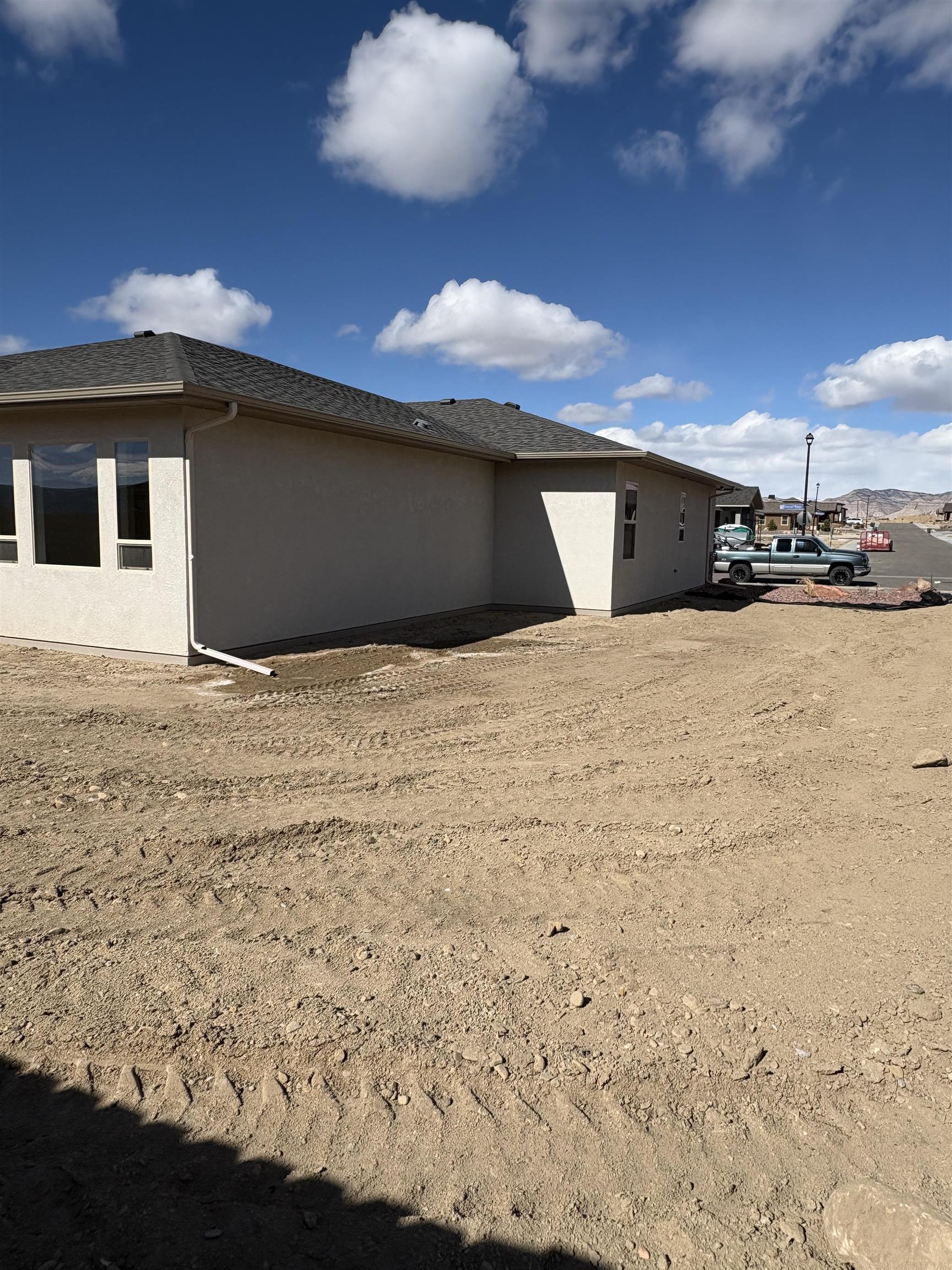 2641 Emerald Ridge Lane Grand Junction, CO 81506 - Photo 40 of 42 a view of a backyard of the house