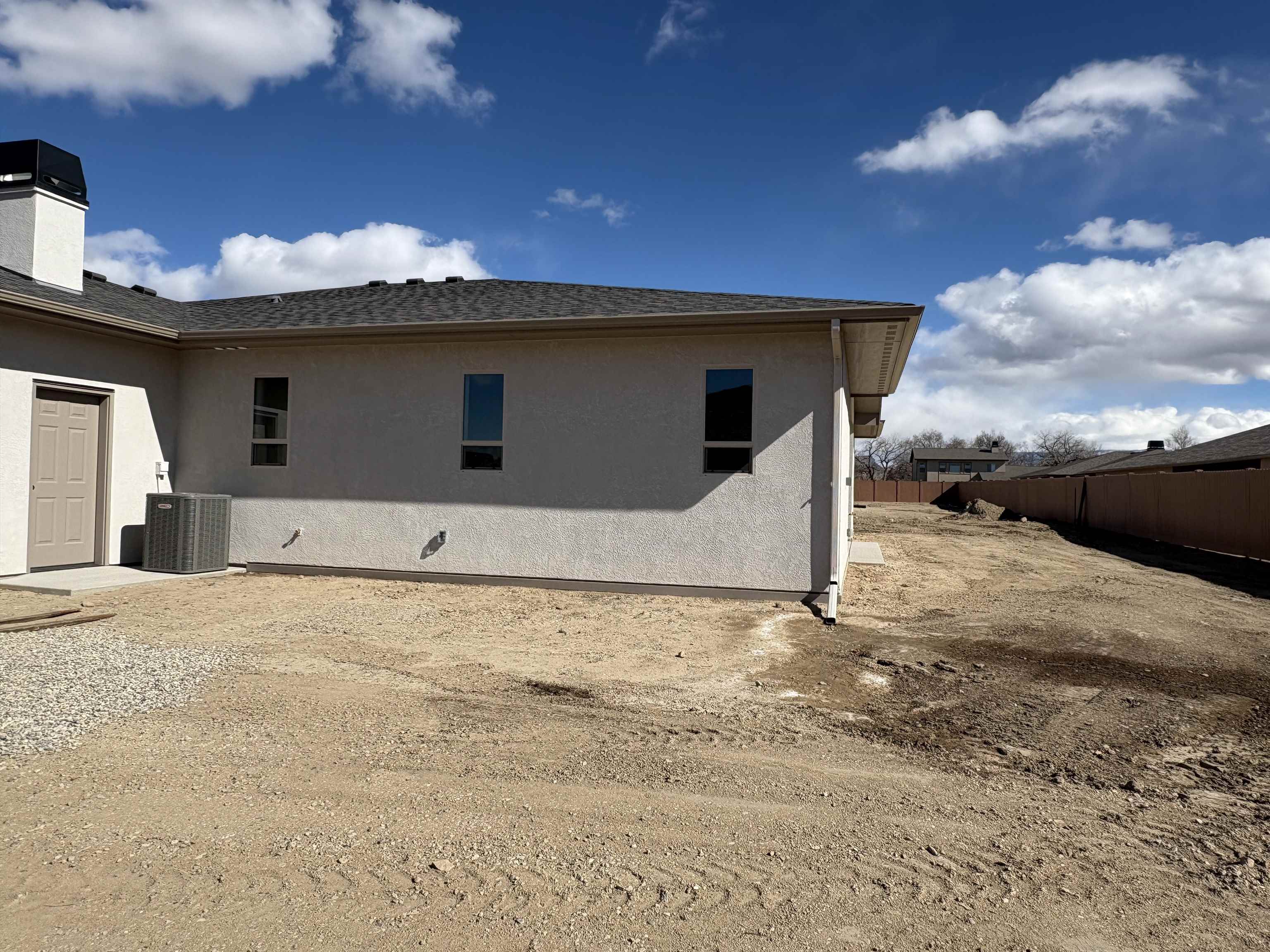 2641 Emerald Ridge Lane Grand Junction, CO 81506 - Photo 41 of 42 a house with yard in front of it