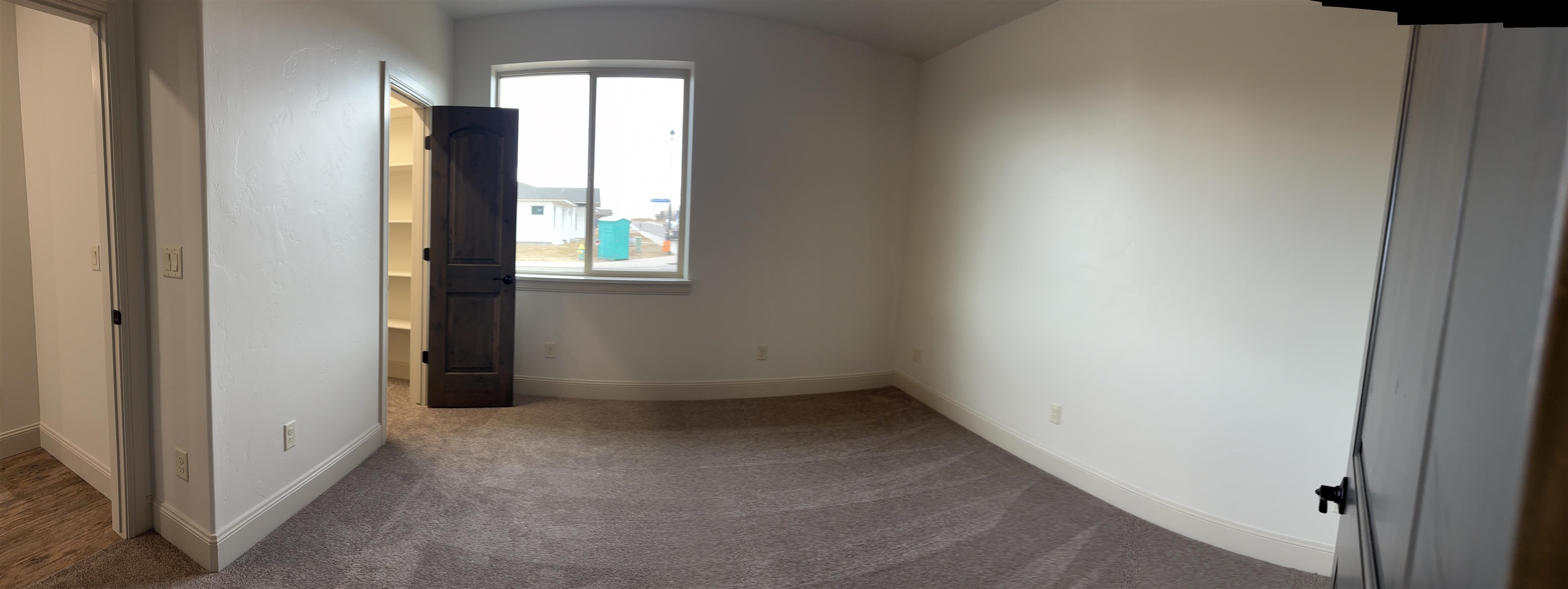 2641 Emerald Ridge Lane Grand Junction, CO 81506 - Photo 9 of 42 an empty room with windows and closet