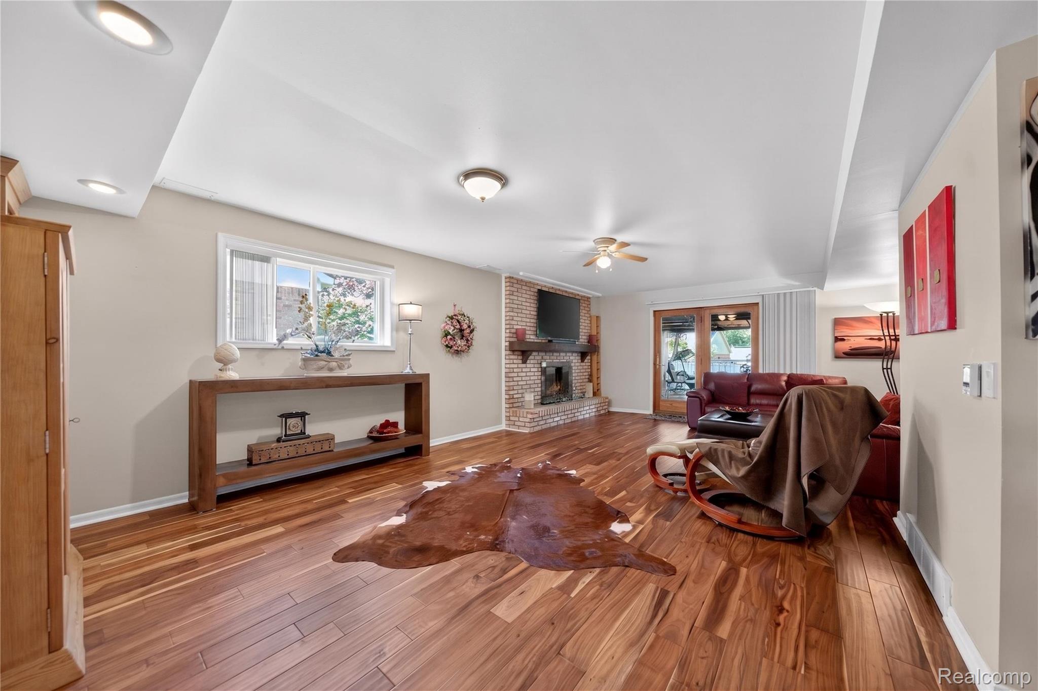 309 Antoinette Drive Rochester, MI 48309 - Photo 13 of 36 Family Room with heated floor for winter comfort.