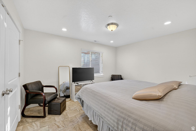 141 Wolverine Creek Elk Ridge, UT 84651 - Photo 19 of 47 Bedroom featuring recessed lighting and a closet