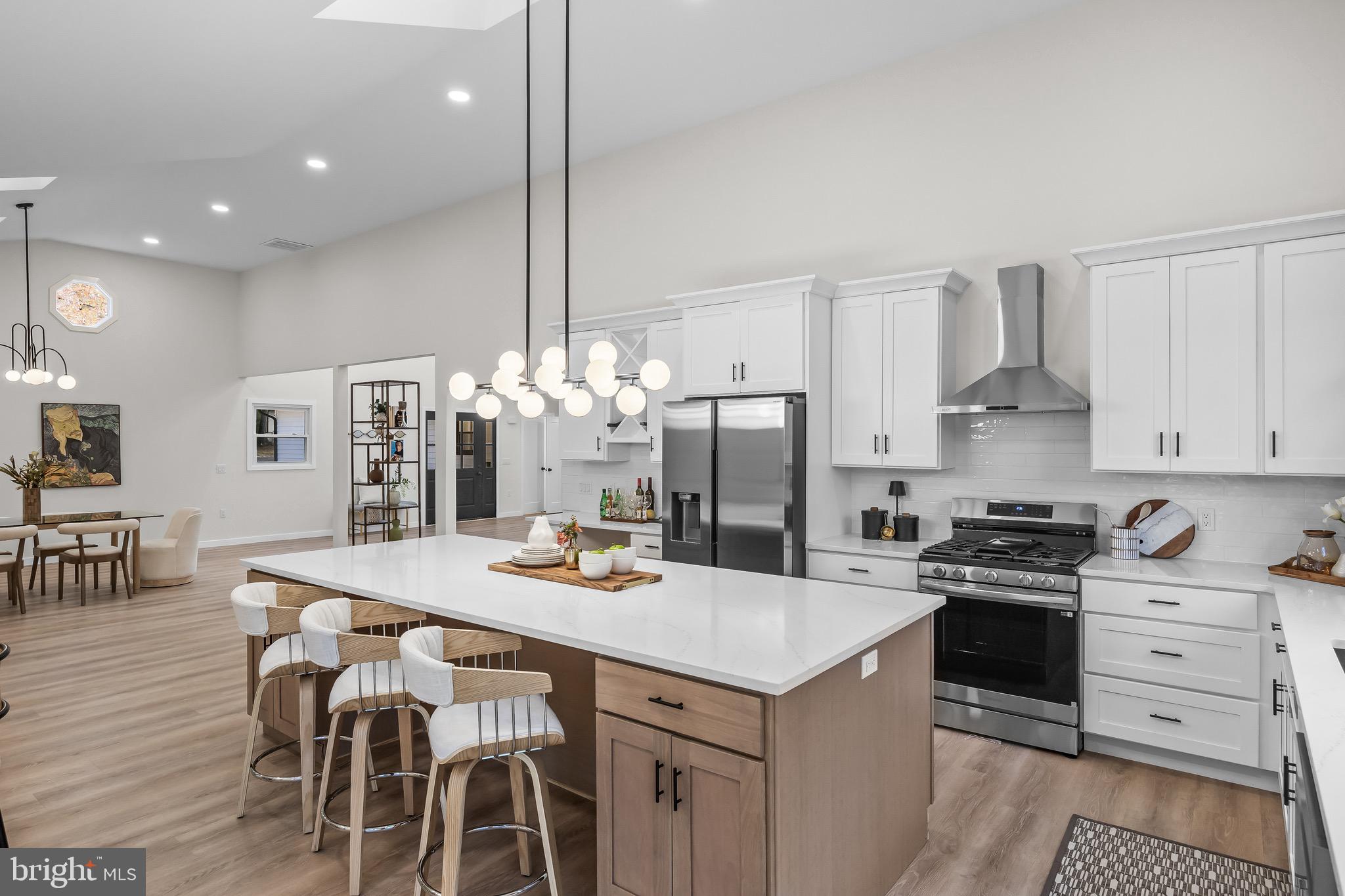 17 West Delaware Trail Medford, NJ 08055 - Photo 23 of 54 a kitchen that has a table and chairs in it