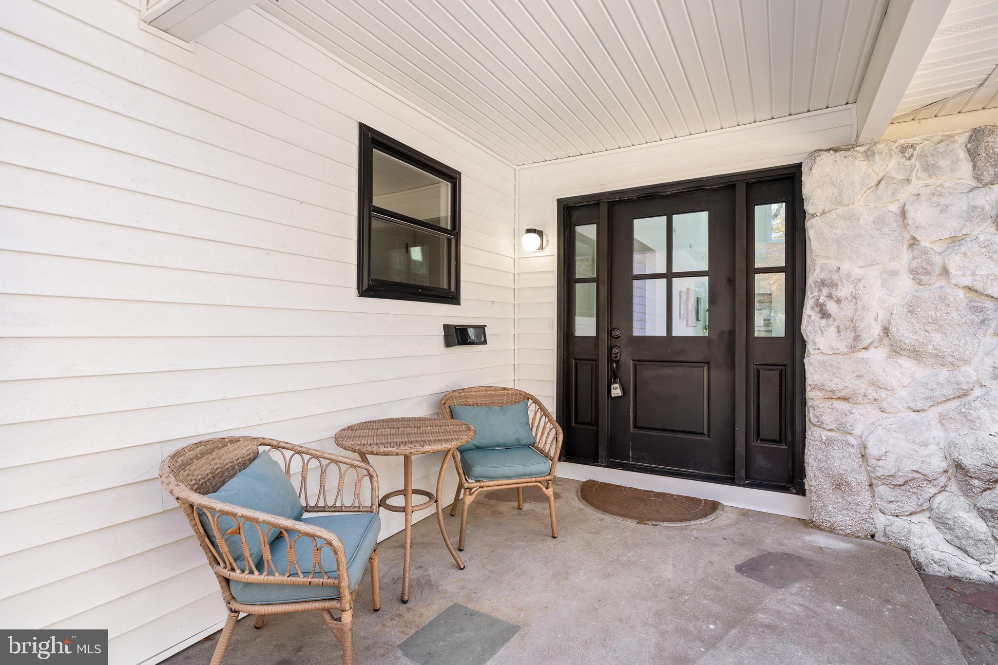 17 West Delaware Trail Medford, NJ 08055 - Photo 5 of 54 a balcony with table and chairs