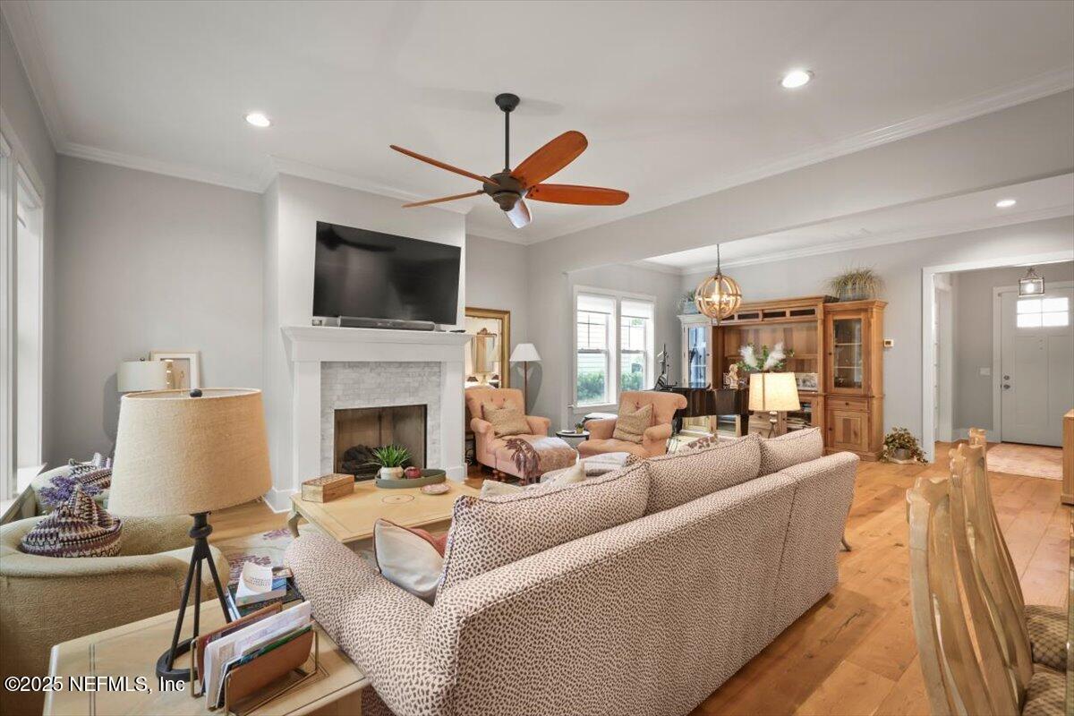 740 Paradise Lane Atlantic Beach, FL 32233 - Photo 11 of 38 a living room with fireplace furniture and a flat screen tv