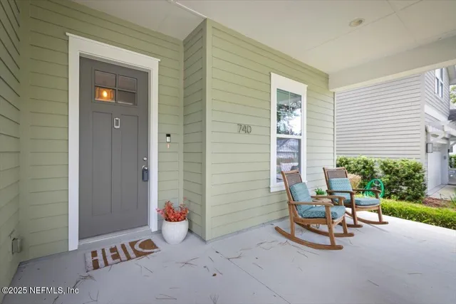 a view of a hallway with a door
